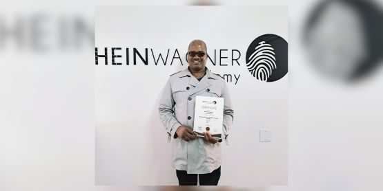 Don and Maatje sharing a hug and bragging with their Master Chef winning certificate